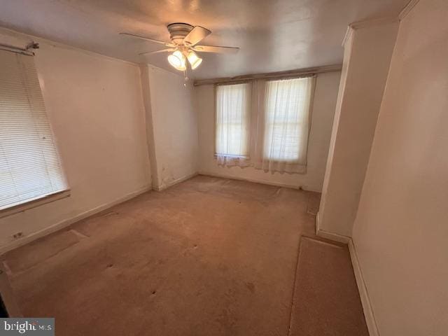 spare room featuring ceiling fan