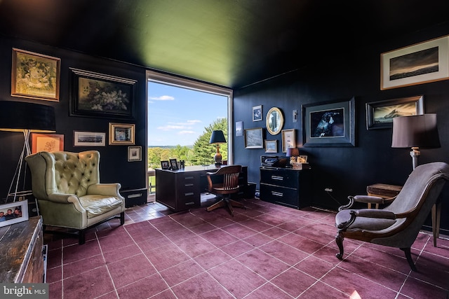 living area featuring tile patterned flooring