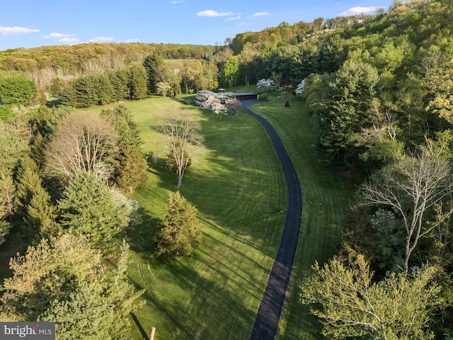 birds eye view of property with a rural view