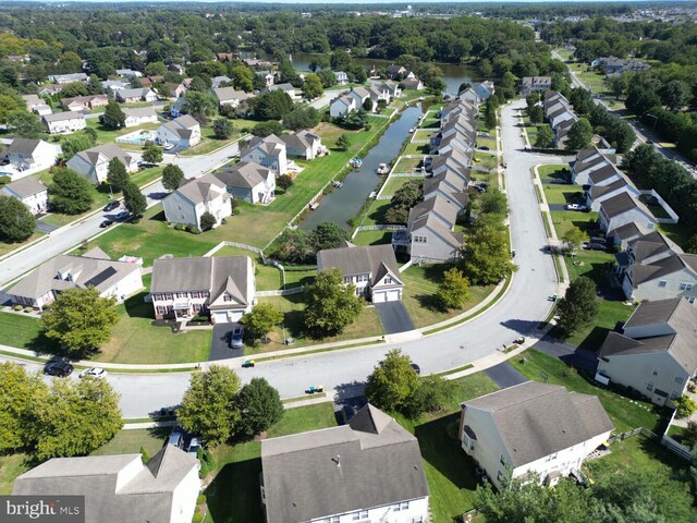 aerial view featuring a water view and a residential view