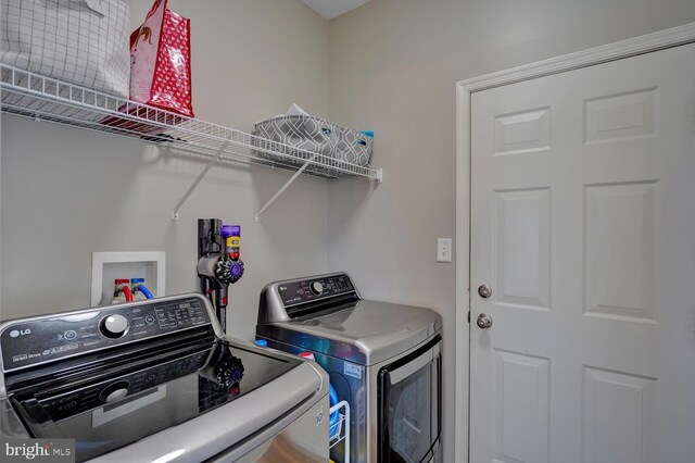 laundry room featuring laundry area and separate washer and dryer