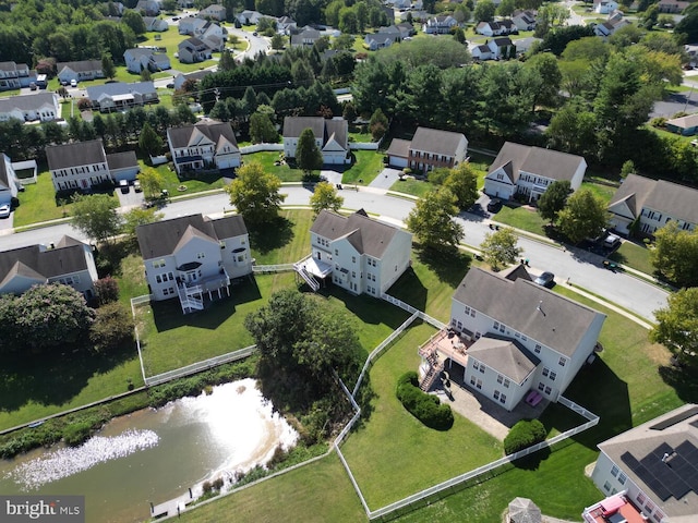 aerial view with a water view and a residential view