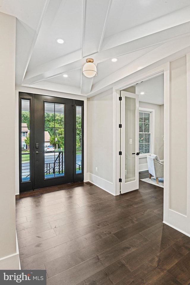 foyer entrance featuring dark wood-style floors, beam ceiling, recessed lighting, coffered ceiling, and baseboards