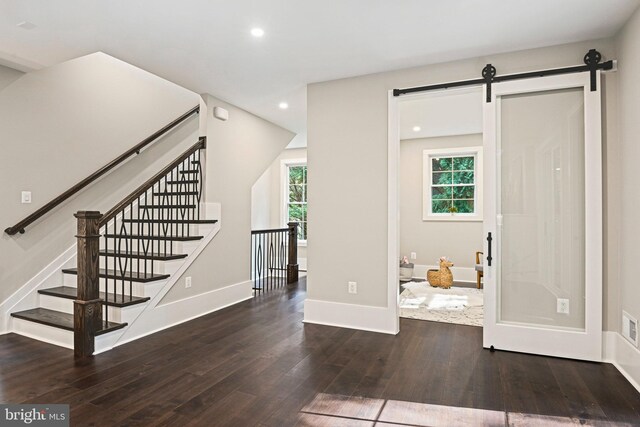 stairs featuring wood-type flooring