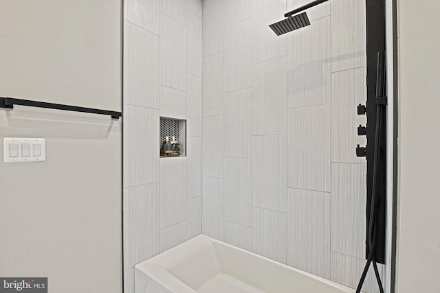 bathroom featuring tiled shower