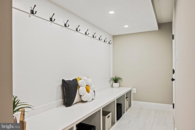 mudroom featuring light tile patterned flooring