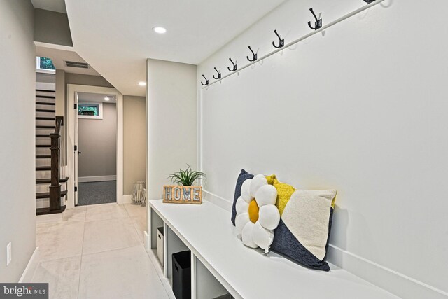 mudroom featuring light tile patterned floors