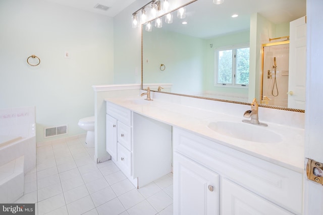 full bath featuring double vanity, visible vents, and a sink