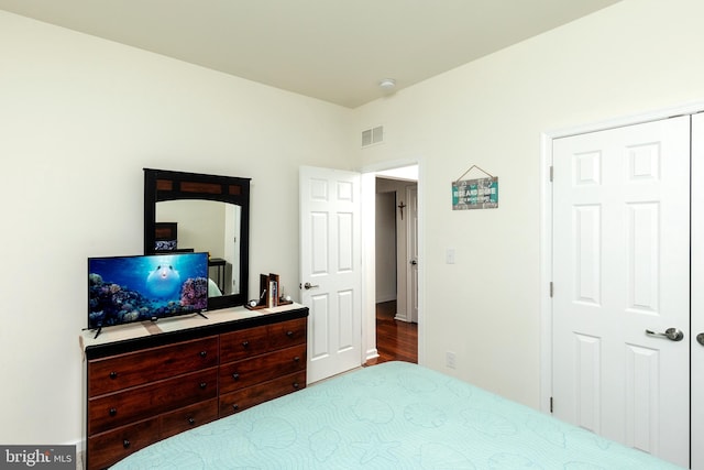 bedroom featuring wood-type flooring