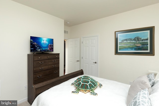 bedroom featuring carpet flooring