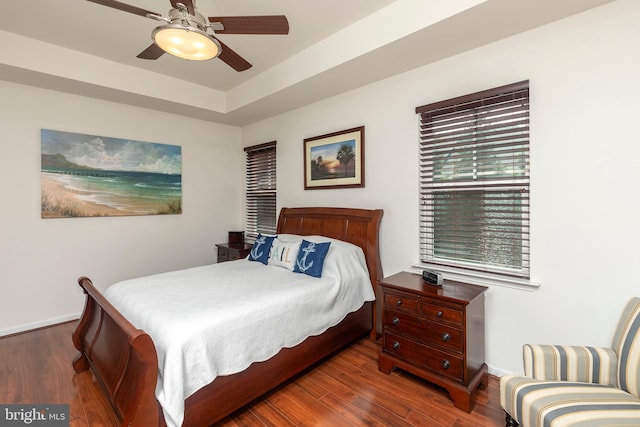 bedroom featuring dark wood-type flooring and ceiling fan