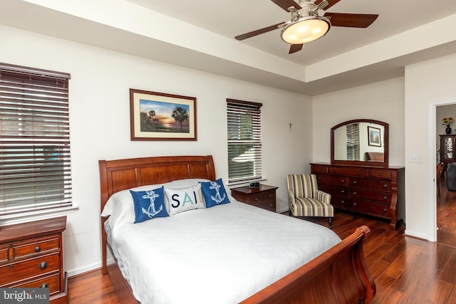 bedroom featuring dark wood-type flooring and ceiling fan