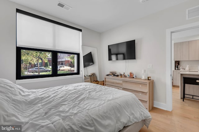 bedroom featuring light hardwood / wood-style flooring