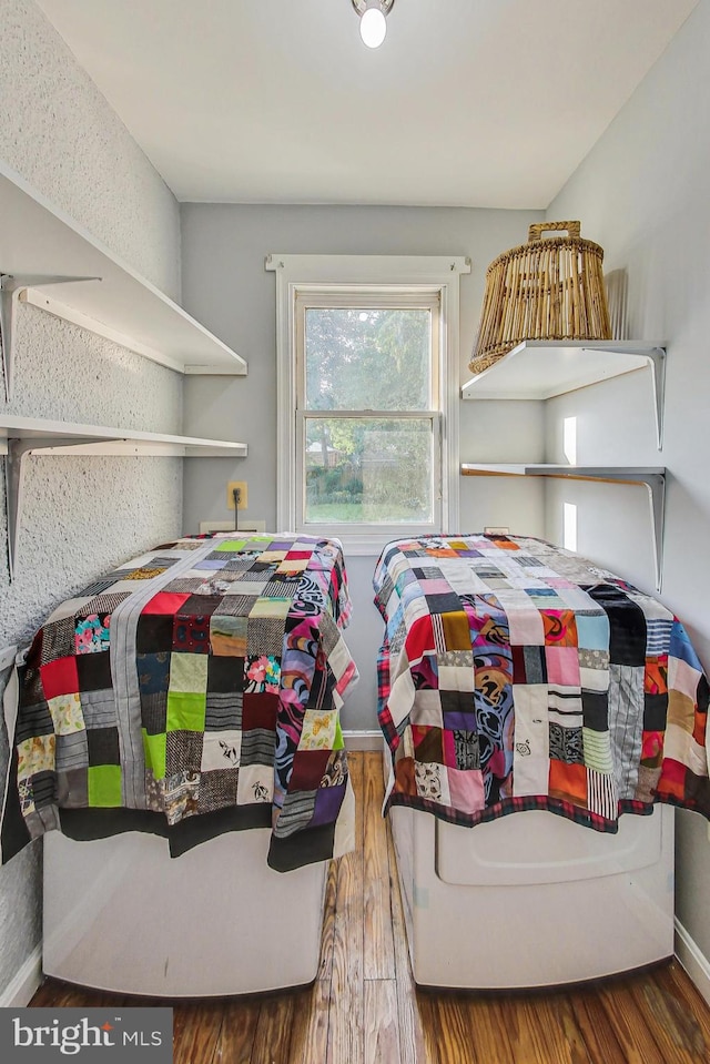 bedroom featuring hardwood / wood-style flooring