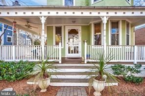 property entrance featuring a porch