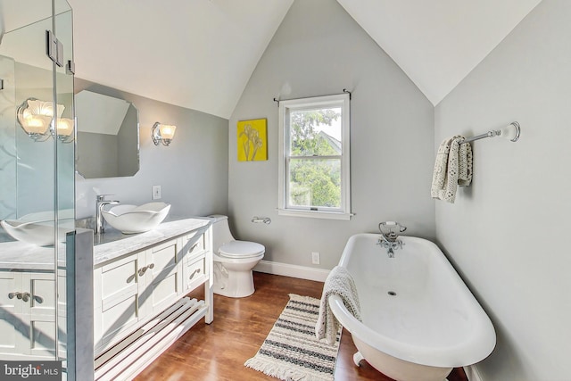 full bathroom with vanity, lofted ceiling, toilet, separate shower and tub, and hardwood / wood-style floors