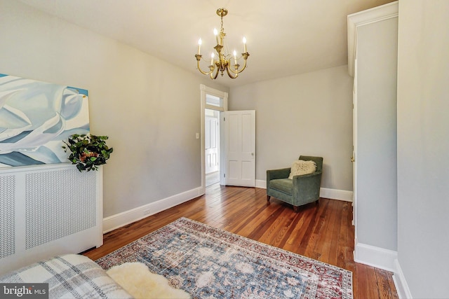 entrance foyer featuring a chandelier and hardwood / wood-style floors