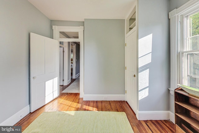 bedroom featuring hardwood / wood-style flooring