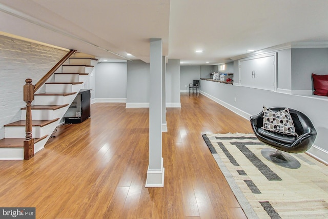 basement featuring light hardwood / wood-style flooring