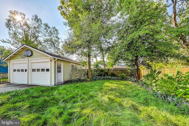 view of yard featuring a garage