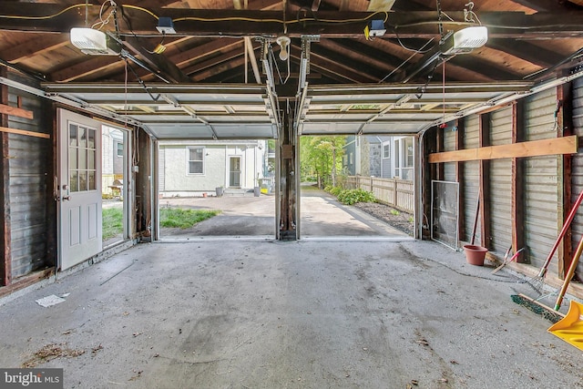 garage featuring a garage door opener