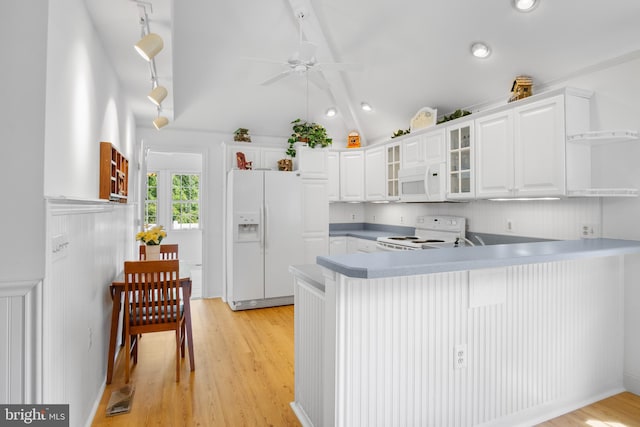 kitchen featuring white appliances, light hardwood / wood-style floors, kitchen peninsula, white cabinetry, and ceiling fan