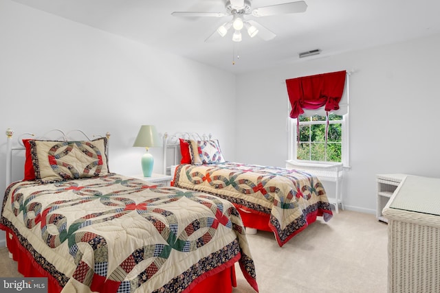 bedroom featuring ceiling fan and carpet floors