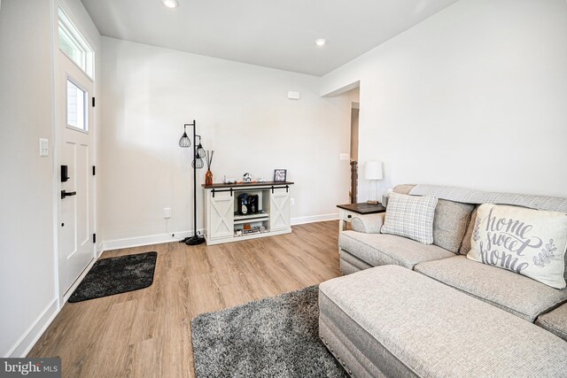 interior space featuring plenty of natural light and light hardwood / wood-style floors