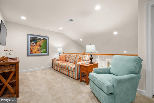 living area featuring light colored carpet, visible vents, vaulted ceiling, and recessed lighting