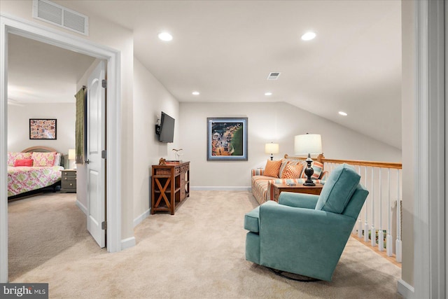 living area featuring lofted ceiling and carpet floors