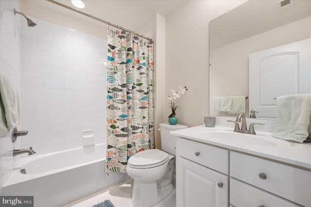 bathroom with toilet, vanity, visible vents, tile patterned floors, and shower / bath combo with shower curtain