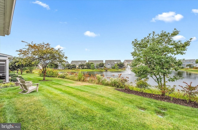 view of yard featuring a water view