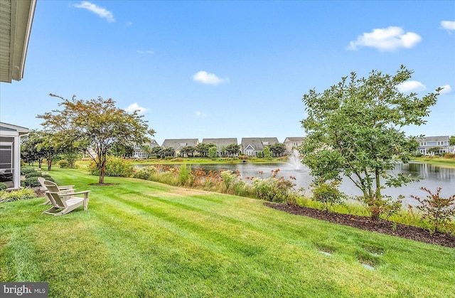 view of yard with a water view