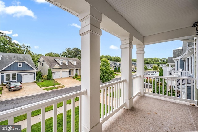 balcony with a residential view and a porch