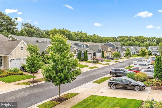 view of road featuring a residential view and sidewalks