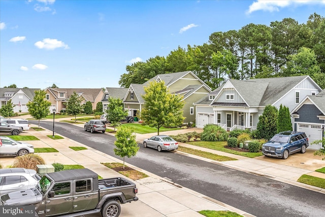 view of street with a residential view, curbs, and sidewalks