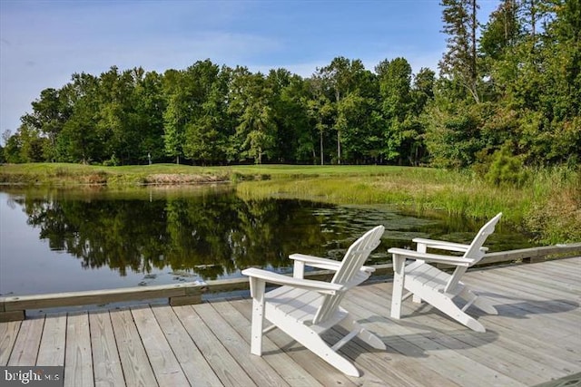 view of dock with a deck with water view