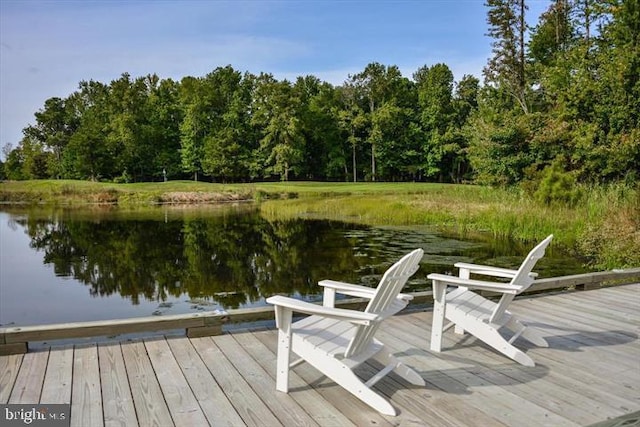 dock area with a deck with water view