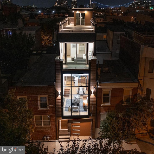 contemporary house featuring a balcony