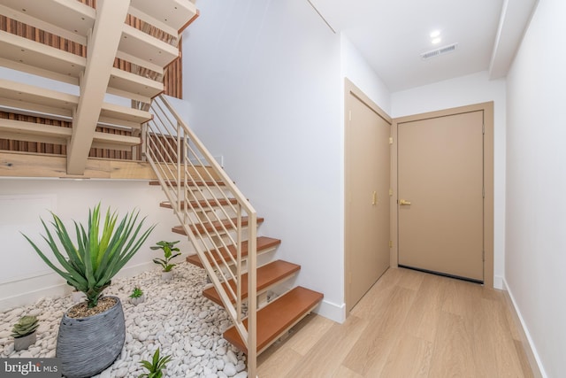 interior space with hardwood / wood-style flooring