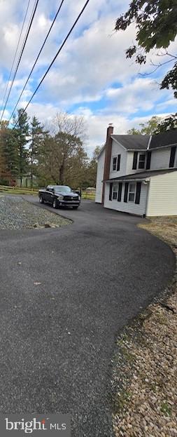 14352 Charmian Rd, Waynesboro, PA 17268 - view of property exterior with a chimney and aphalt driveway
