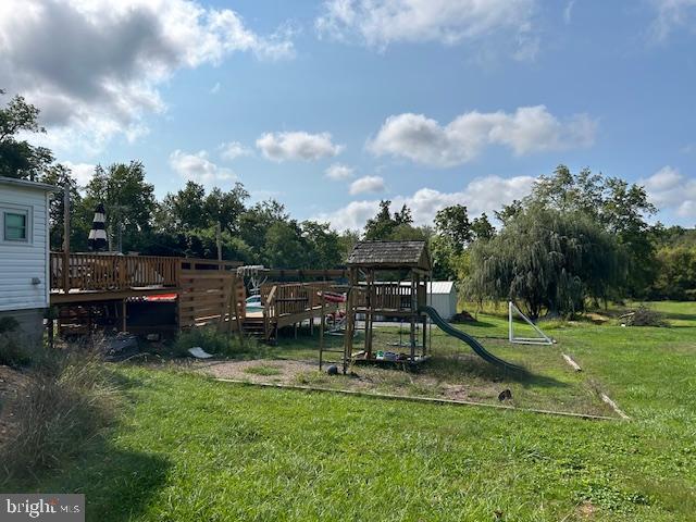 14352 Charmian Rd, Waynesboro, PA 17268 - view of play area featuring a yard and a deck