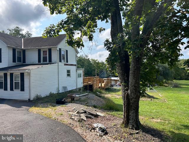 14352 Charmian Rd, Waynesboro, PA 17268 - view of property exterior with a lawn and a deck