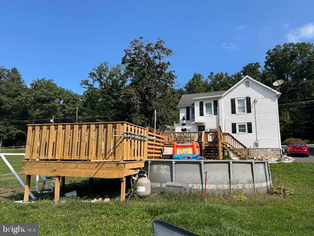 14352 Charmian Rd, Waynesboro, PA 17268 - rear view of property with a lawn, an outdoor pool, and a deck