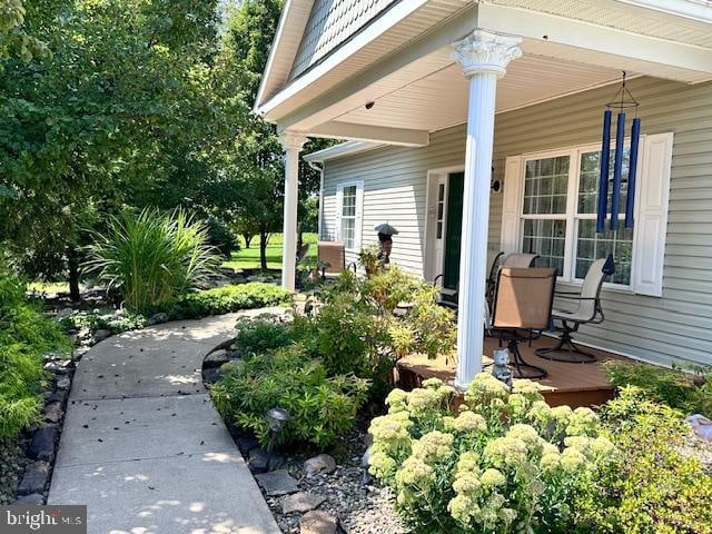 exterior space featuring covered porch