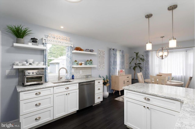 kitchen featuring dark wood finished floors, open shelves, white cabinetry, a sink, and dishwasher