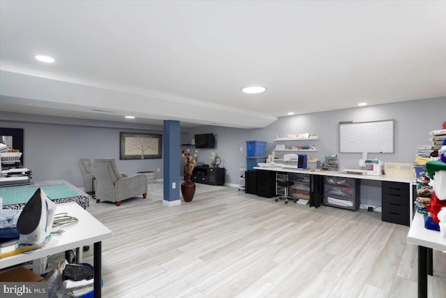 home office featuring baseboards, light wood-type flooring, and recessed lighting