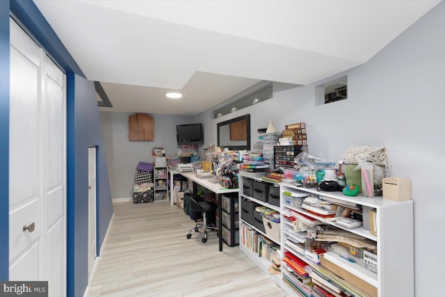 office space featuring wood finished floors