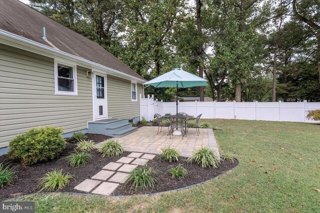 view of yard with a patio area and fence