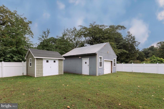 detached garage with fence